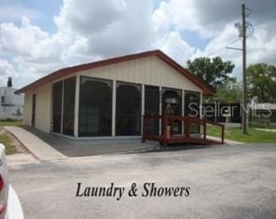 NO LOT RENT, it is a deeded lot, 2 bedrooms 1-1/2 Baths on Tooke on Glen Lakes Country Club in Florida - for sale on GolfHomes.com, golf home, golf lot