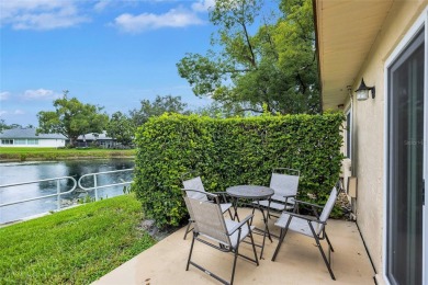Gorgeous end-unit villa in a prime location with stunning on Highland Lakes Executive Golf Course in Florida - for sale on GolfHomes.com, golf home, golf lot