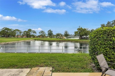Gorgeous end-unit villa in a prime location with stunning on Highland Lakes Executive Golf Course in Florida - for sale on GolfHomes.com, golf home, golf lot