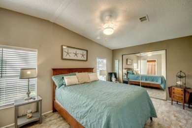 Move-in ready and beautifully furnished, this two-bedroom on Pine Lakes Country Club in Florida - for sale on GolfHomes.com, golf home, golf lot