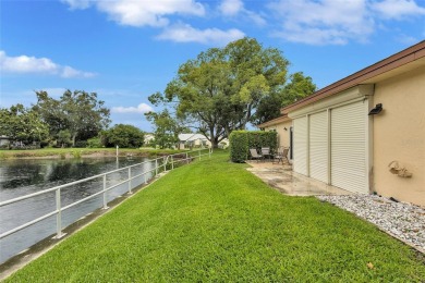 Gorgeous end-unit villa in a prime location with stunning on Highland Lakes Executive Golf Course in Florida - for sale on GolfHomes.com, golf home, golf lot
