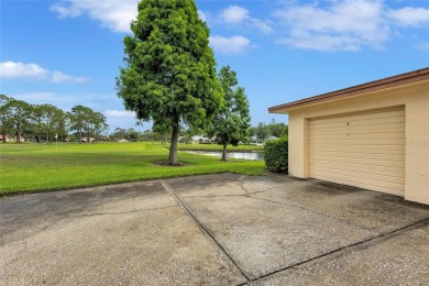 Gorgeous end-unit villa in a prime location with stunning on Highland Lakes Executive Golf Course in Florida - for sale on GolfHomes.com, golf home, golf lot