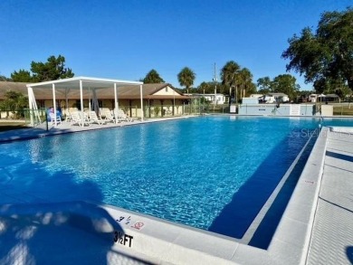 NO LOT RENT, it is a deeded lot, 2 bedrooms 1-1/2 Baths on Tooke on Glen Lakes Country Club in Florida - for sale on GolfHomes.com, golf home, golf lot