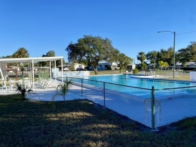 NO LOT RENT, it is a deeded lot, 2 bedrooms 1-1/2 Baths on Tooke on Glen Lakes Country Club in Florida - for sale on GolfHomes.com, golf home, golf lot