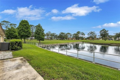 Gorgeous end-unit villa in a prime location with stunning on Highland Lakes Executive Golf Course in Florida - for sale on GolfHomes.com, golf home, golf lot