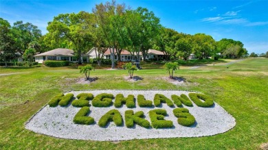 Gorgeous end-unit villa in a prime location with stunning on Highland Lakes Executive Golf Course in Florida - for sale on GolfHomes.com, golf home, golf lot