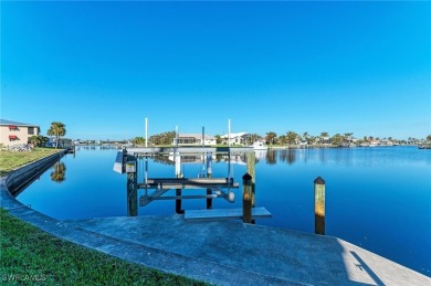 Fall in love with this 2015 built custom waterfront pool home on Saint Andrews South Golf Club in Florida - for sale on GolfHomes.com, golf home, golf lot