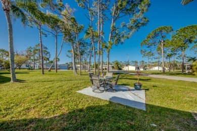 Move-in ready and beautifully furnished, this two-bedroom on Pine Lakes Country Club in Florida - for sale on GolfHomes.com, golf home, golf lot