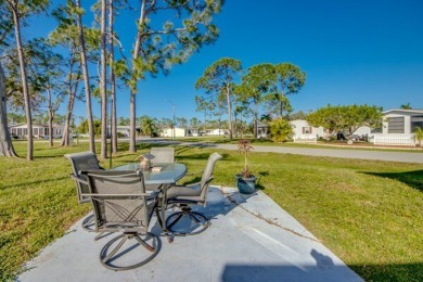 Move-in ready and beautifully furnished, this two-bedroom on Pine Lakes Country Club in Florida - for sale on GolfHomes.com, golf home, golf lot