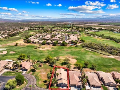 Nestled between the majestic backdrop of golf course greens and on Mojave Resort Golf Club in Nevada - for sale on GolfHomes.com, golf home, golf lot