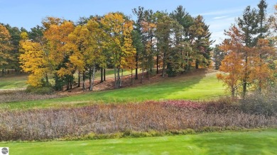 Located in the heart of Leland, this vacant parcel is one of a on Leland Country Club in Michigan - for sale on GolfHomes.com, golf home, golf lot