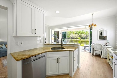 SIMPLY PERFECT! Rarely available FIRST FLOOR END UNIT, COMPLETE on Bonita Bay West in Florida - for sale on GolfHomes.com, golf home, golf lot