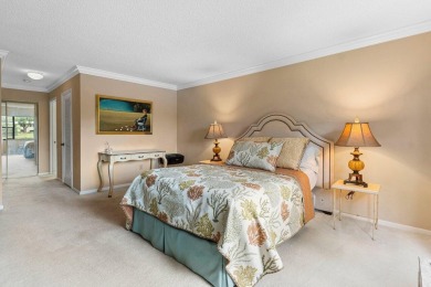 Discover stunning views in this first-floor condo featuring 2 on Hunters Run Golf and Country Club in Florida - for sale on GolfHomes.com, golf home, golf lot
