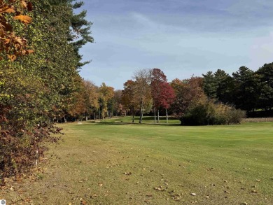 Located in the heart of Leland, this vacant parcel is one of a on Leland Country Club in Michigan - for sale on GolfHomes.com, golf home, golf lot