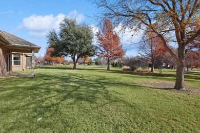 Beautiful open Monroe plan located on a tranquil Greenbelt in on Frisco Lakes Golf Course in Texas - for sale on GolfHomes.com, golf home, golf lot