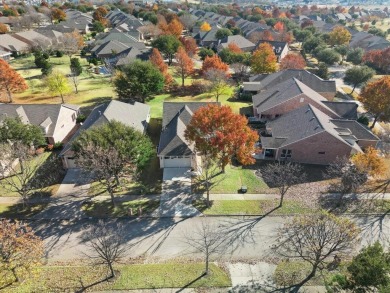 Beautiful open Monroe plan located on a tranquil Greenbelt in on Frisco Lakes Golf Course in Texas - for sale on GolfHomes.com, golf home, golf lot