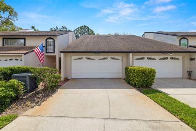 Stunning Pond & Golf Course Views from this AMAZING on Carrollwood Country Club in Florida - for sale on GolfHomes.com, golf home, golf lot
