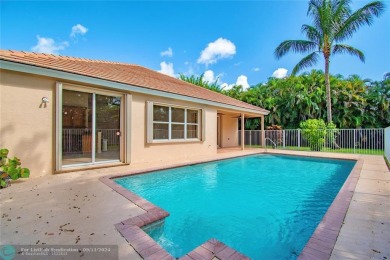 This charming single story family home is nestled in the on Osprey Point Golf Course in Florida - for sale on GolfHomes.com, golf home, golf lot