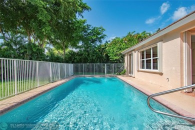 This charming single story family home is nestled in the on Osprey Point Golf Course in Florida - for sale on GolfHomes.com, golf home, golf lot