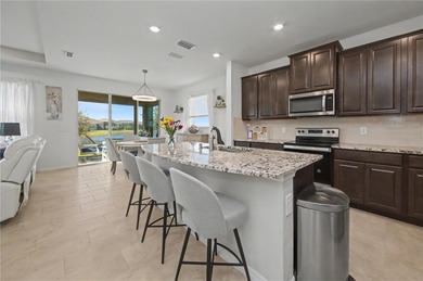 Experience the perfect family home on a quiet cul-de-sac in on Lakewood National Golf Club in Florida - for sale on GolfHomes.com, golf home, golf lot