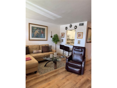 Spacious 1/1 ground floor condo with lots of sunlight and nice on Sunrise Lakes Phase III in Florida - for sale on GolfHomes.com, golf home, golf lot