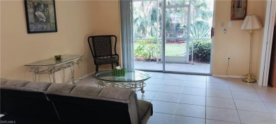 Charming pristine condo with 2 master suites and parking right on Quail Run Golf Club In Naples in Florida - for sale on GolfHomes.com, golf home, golf lot