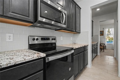 Experience the perfect family home on a quiet cul-de-sac in on Lakewood National Golf Club in Florida - for sale on GolfHomes.com, golf home, golf lot