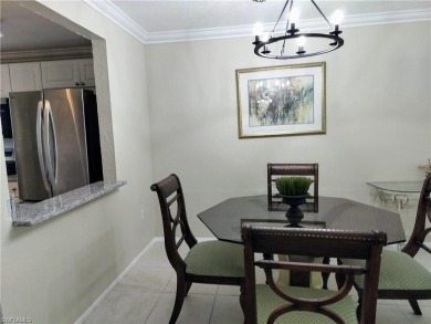 Charming pristine condo with 2 master suites and parking right on Quail Run Golf Club In Naples in Florida - for sale on GolfHomes.com, golf home, golf lot
