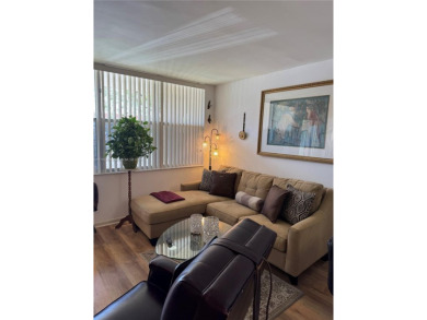 Spacious 1/1 ground floor condo with lots of sunlight and nice on Sunrise Lakes Phase III in Florida - for sale on GolfHomes.com, golf home, golf lot