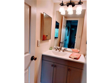 Charming pristine condo with 2 master suites and parking right on Quail Run Golf Club In Naples in Florida - for sale on GolfHomes.com, golf home, golf lot