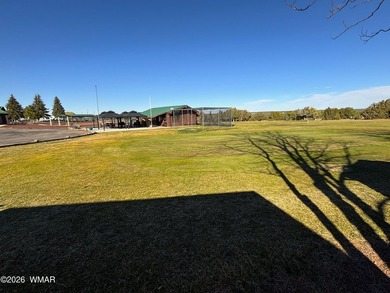 LOCATION, LOCATION, LOCATION!! This park model is a catch in the on Juniper Ridge R.V. Golf Resort in Arizona - for sale on GolfHomes.com, golf home, golf lot