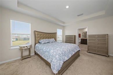 Experience the perfect family home on a quiet cul-de-sac in on Lakewood National Golf Club in Florida - for sale on GolfHomes.com, golf home, golf lot