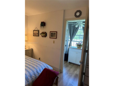 Spacious 1/1 ground floor condo with lots of sunlight and nice on Sunrise Lakes Phase III in Florida - for sale on GolfHomes.com, golf home, golf lot
