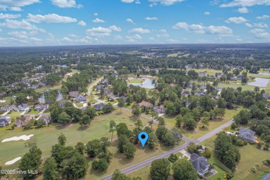 Build your dream home on this prime homesite in a premier golf on Brunswick Plantation and Golf Resorts in North Carolina - for sale on GolfHomes.com, golf home, golf lot