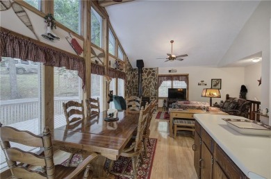 Tucked into the natural beauty of Bent Tree, this charming on Bent Tree Golf Course in Georgia - for sale on GolfHomes.com, golf home, golf lot