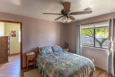 Welcome to this beautifully maintained 1,630 sq ft 2 bed, 2 bath on London Bridge Golf Course in Arizona - for sale on GolfHomes.com, golf home, golf lot