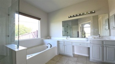 Meticulously maintained and perfectly situated on the 16th green on Ridgeview Ranch Golf Club in Texas - for sale on GolfHomes.com, golf home, golf lot