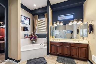 Discover refined single-level living in the prestigious enclave on Prescott Lakes Golf and Country Club in Arizona - for sale on GolfHomes.com, golf home, golf lot