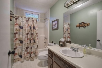 Tucked into the natural beauty of Bent Tree, this charming on Bent Tree Golf Course in Georgia - for sale on GolfHomes.com, golf home, golf lot