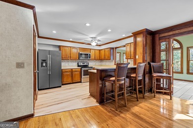 Tucked into the heart of Peachtree City, this home has been on Canongate At Flat Creek Club in Georgia - for sale on GolfHomes.com, golf home, golf lot