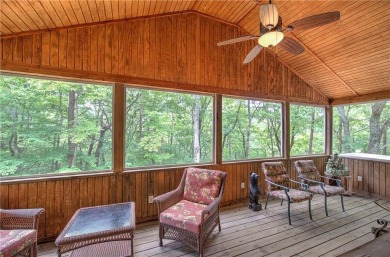 Tucked into the natural beauty of Bent Tree, this charming on Bent Tree Golf Course in Georgia - for sale on GolfHomes.com, golf home, golf lot
