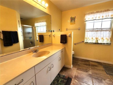 BEAUTIFUL LAKE VIEWS AND FLORIDA CHARM!This wonderful home on Duffys Golf Center in Florida - for sale on GolfHomes.com, golf home, golf lot