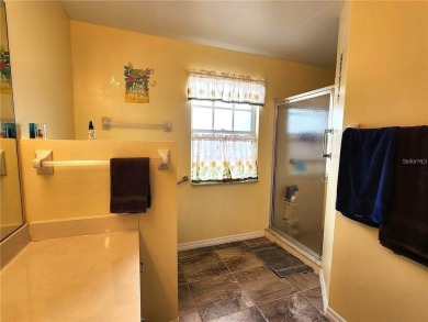 BEAUTIFUL LAKE VIEWS AND FLORIDA CHARM!This wonderful home on Duffys Golf Center in Florida - for sale on GolfHomes.com, golf home, golf lot