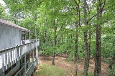Tucked into the natural beauty of Bent Tree, this charming on Bent Tree Golf Course in Georgia - for sale on GolfHomes.com, golf home, golf lot