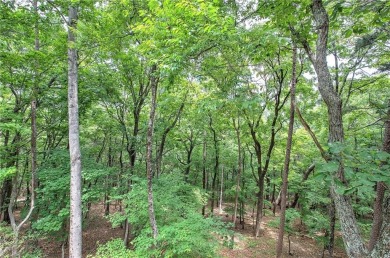 Tucked into the natural beauty of Bent Tree, this charming on Bent Tree Golf Course in Georgia - for sale on GolfHomes.com, golf home, golf lot
