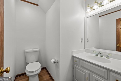 Tucked into the heart of Peachtree City, this home has been on Canongate At Flat Creek Club in Georgia - for sale on GolfHomes.com, golf home, golf lot