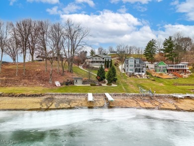 Welcome to your dream lakefront home, where breathtaking views on Lake Mohawk Golf Club in Ohio - for sale on GolfHomes.com, golf home, golf lot