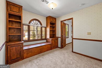 Tucked into the heart of Peachtree City, this home has been on Canongate At Flat Creek Club in Georgia - for sale on GolfHomes.com, golf home, golf lot