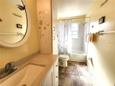 BEAUTIFUL LAKE VIEWS AND FLORIDA CHARM!This wonderful home on Duffys Golf Center in Florida - for sale on GolfHomes.com, golf home, golf lot