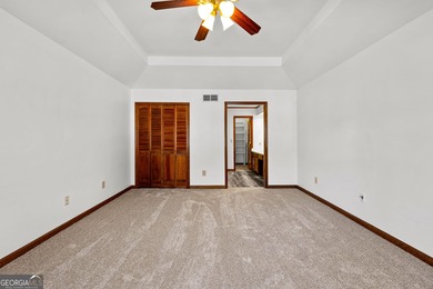 Tucked into the heart of Peachtree City, this home has been on Canongate At Flat Creek Club in Georgia - for sale on GolfHomes.com, golf home, golf lot